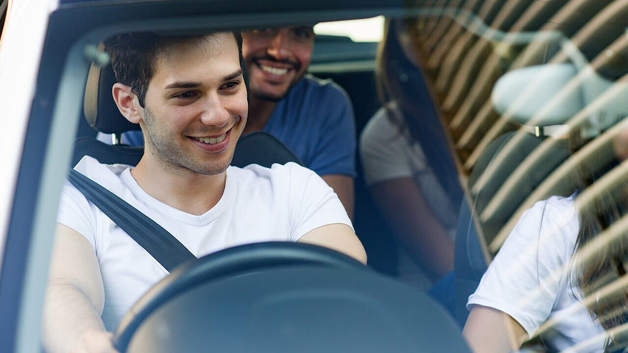 group-of-friends-in-car-banner